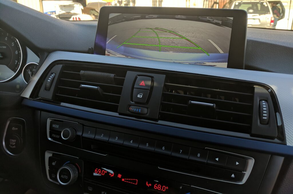 Backup camera integrated into a factory BMW iDrive screen